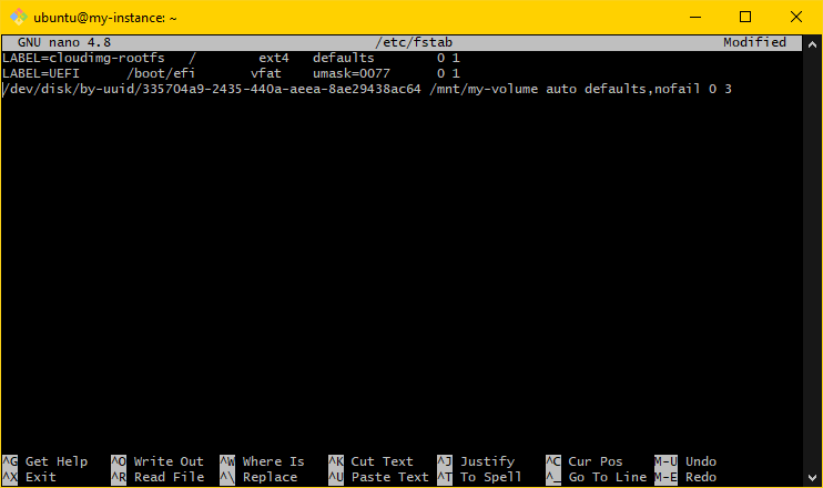 Image showing the MINGW64 terminal. The nano editor is open and the file /etc/fstab is being edited with sudo privileges to allow saving. The suggested line has been added to the file.